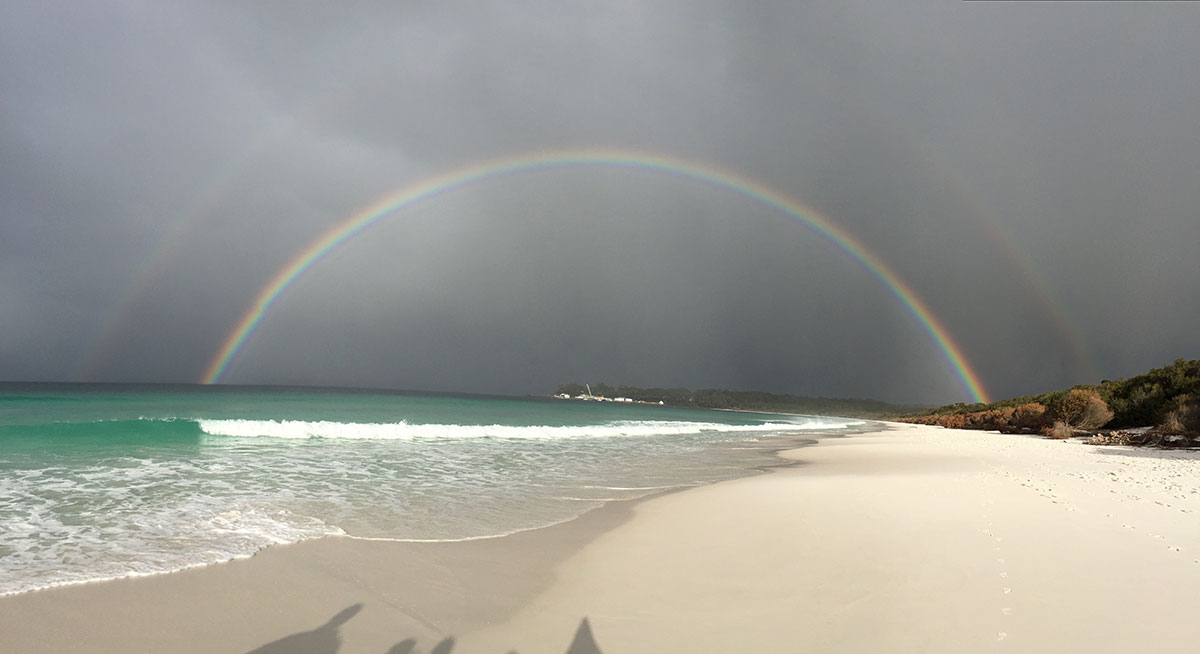 Hyams Beach with a looming storm
